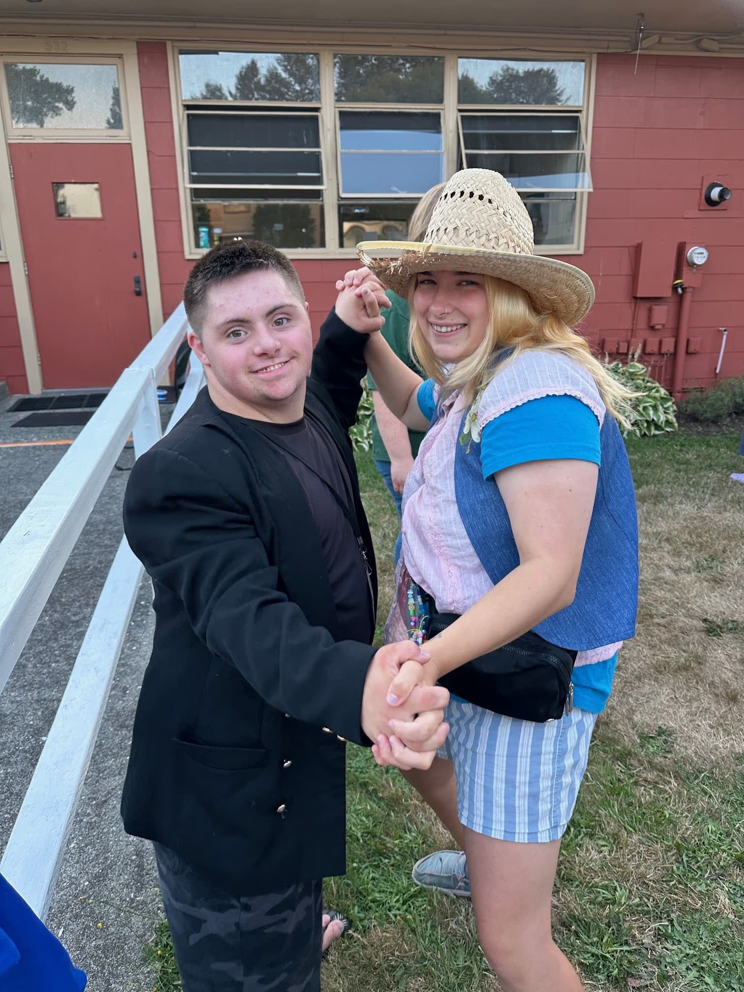 a camper dancing with a counselor