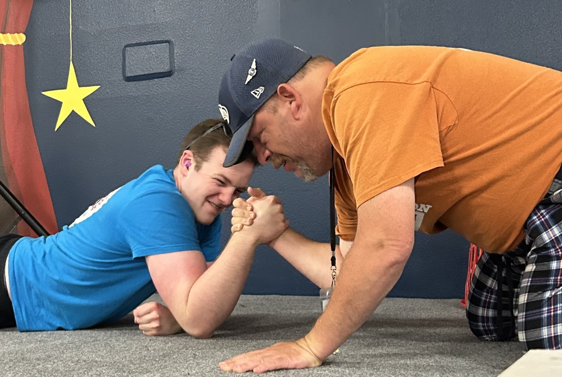 two men arm wrestling