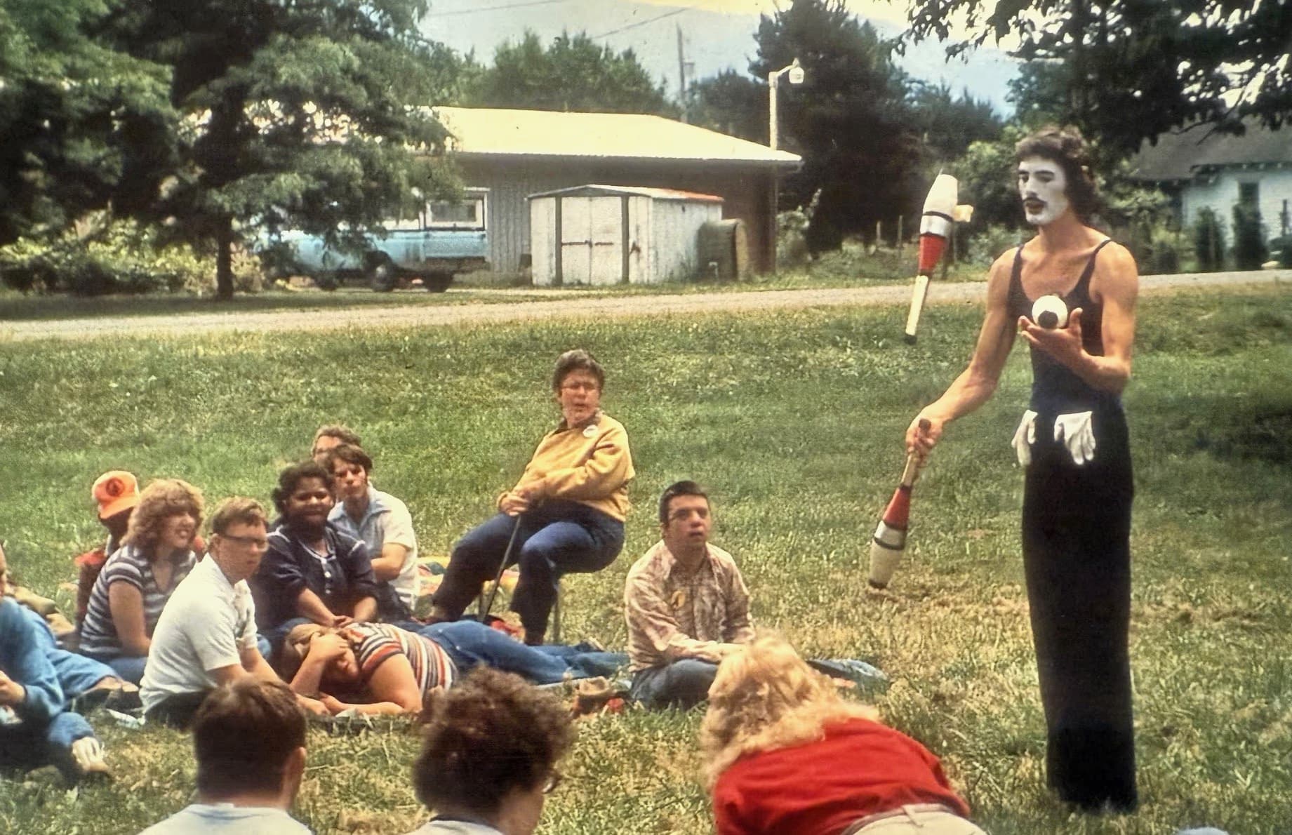 a mime performing for campers